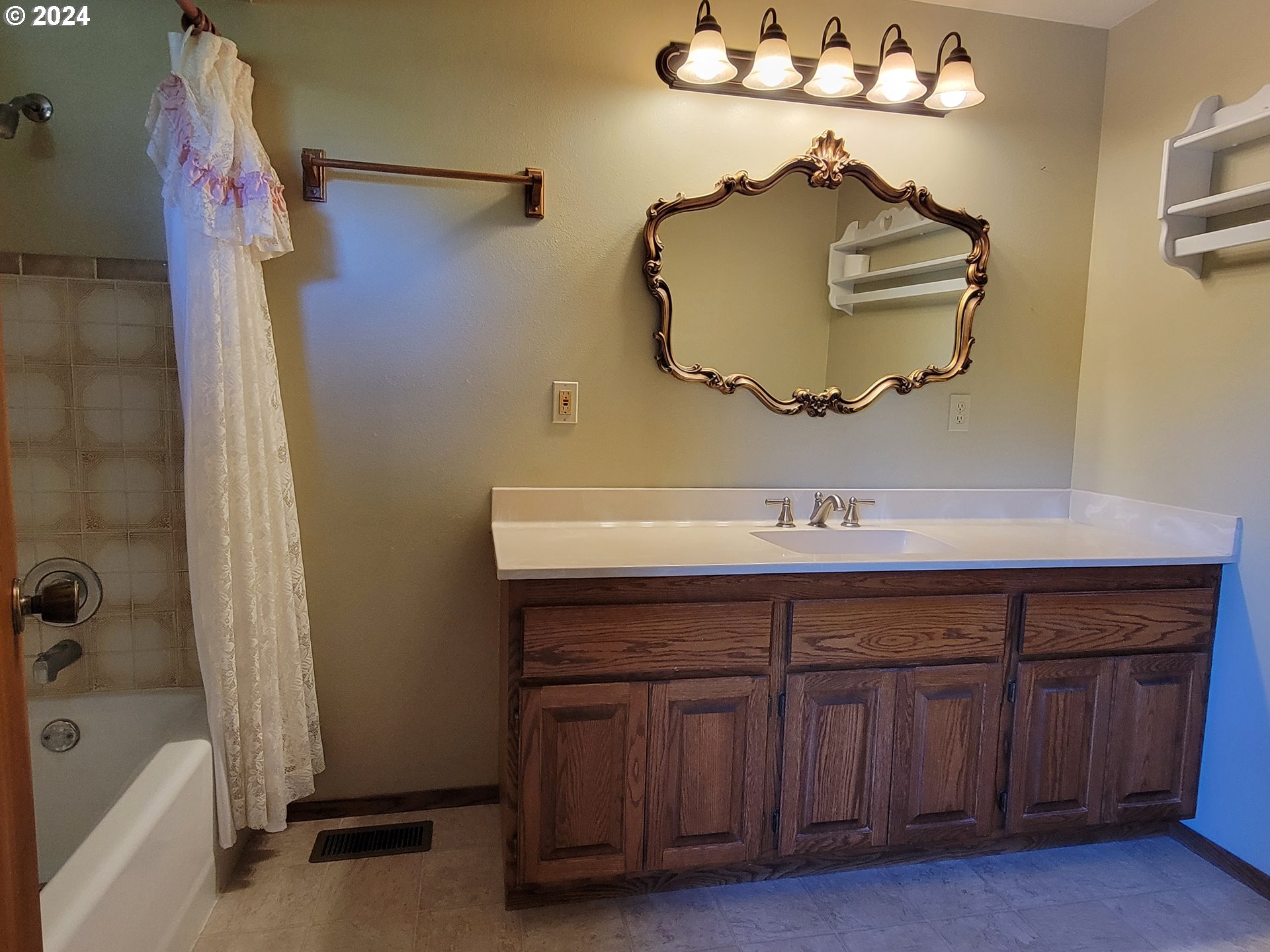 2565 Newcastle Street Eugene, OR 97404 - Photo 28 of 38 a bathroom with a sink and a mirror