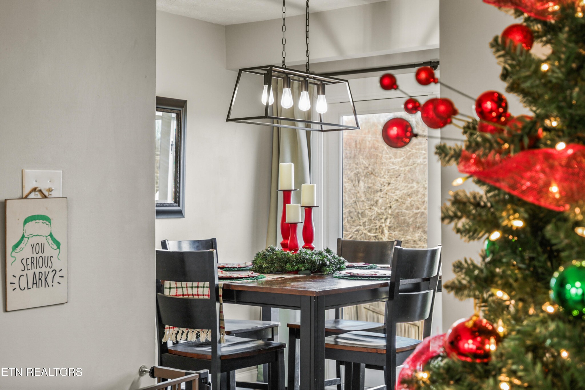 2312 Crestpark Road Knoxville, TN 37912 - Photo 18 of 33 a front view of a dining room with furniture and chandelier