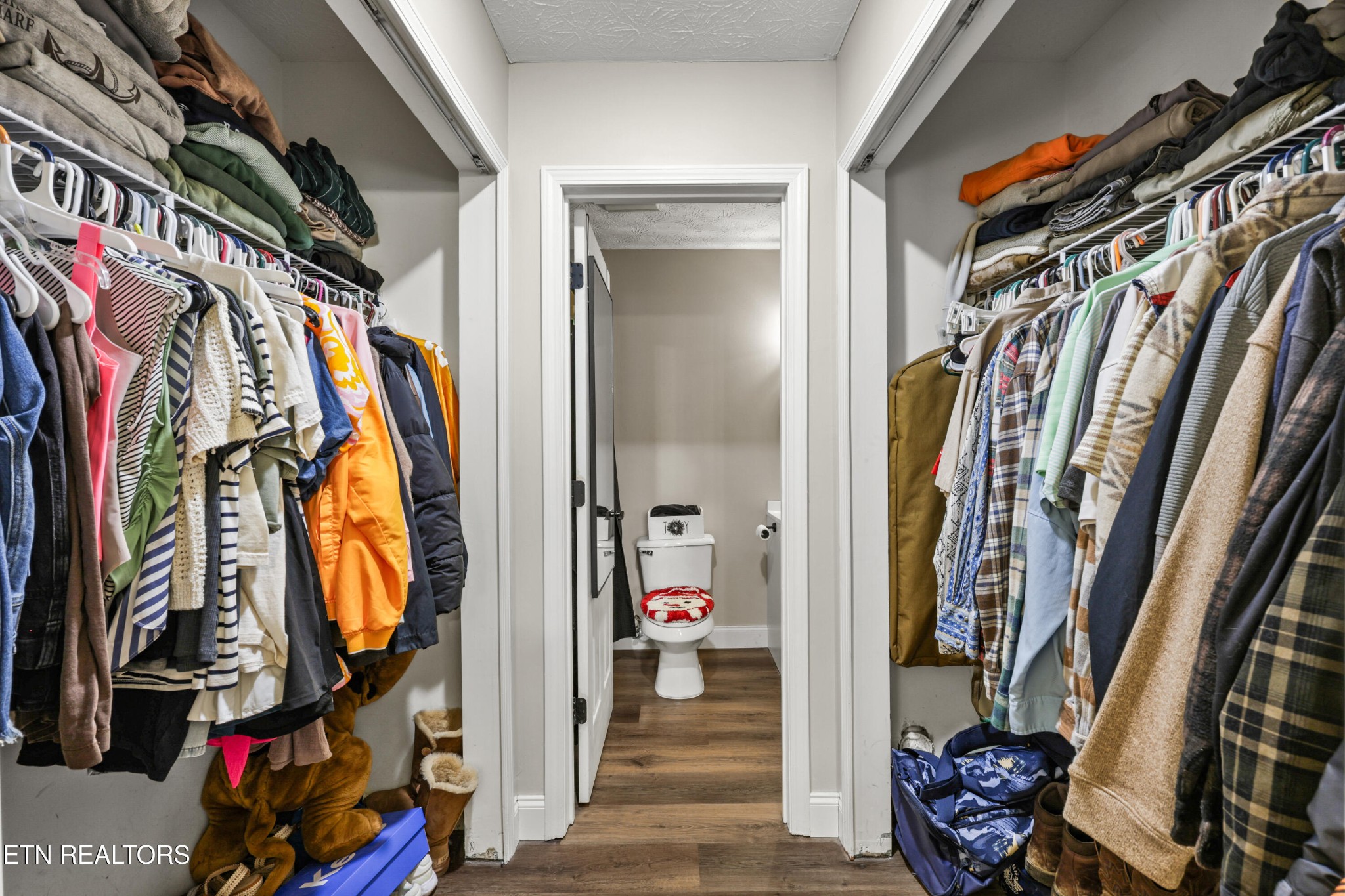 2312 Crestpark Road Knoxville, TN 37912 - Photo 23 of 33 a view of walk in closet with clothes and shoes