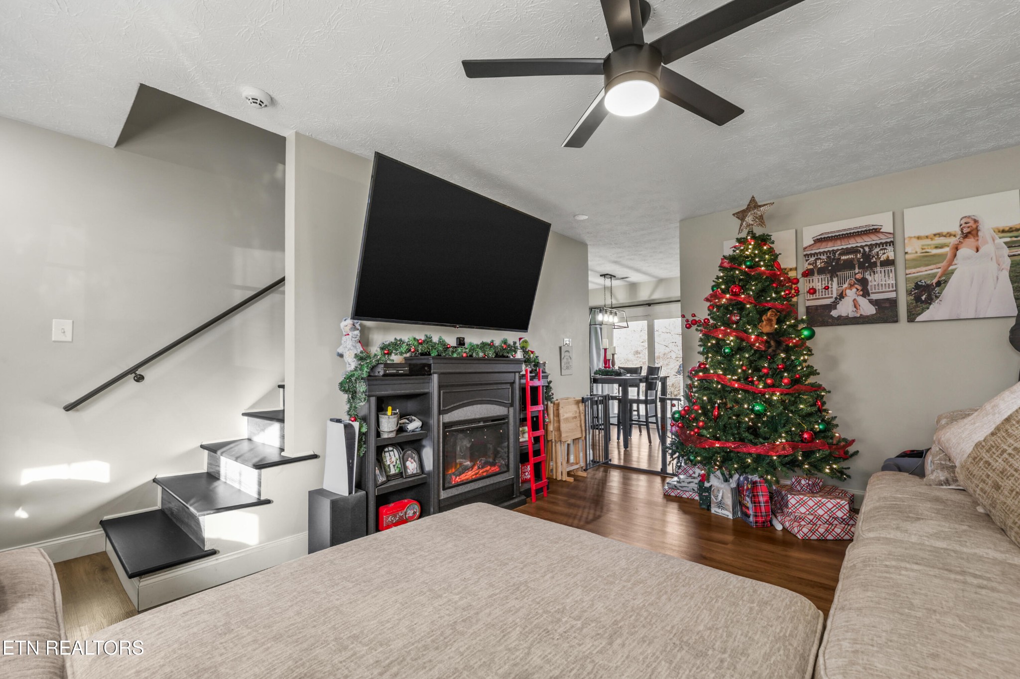 2312 Crestpark Road Knoxville, TN 37912 - Photo 10 of 33 a living room with furniture and a flat screen tv