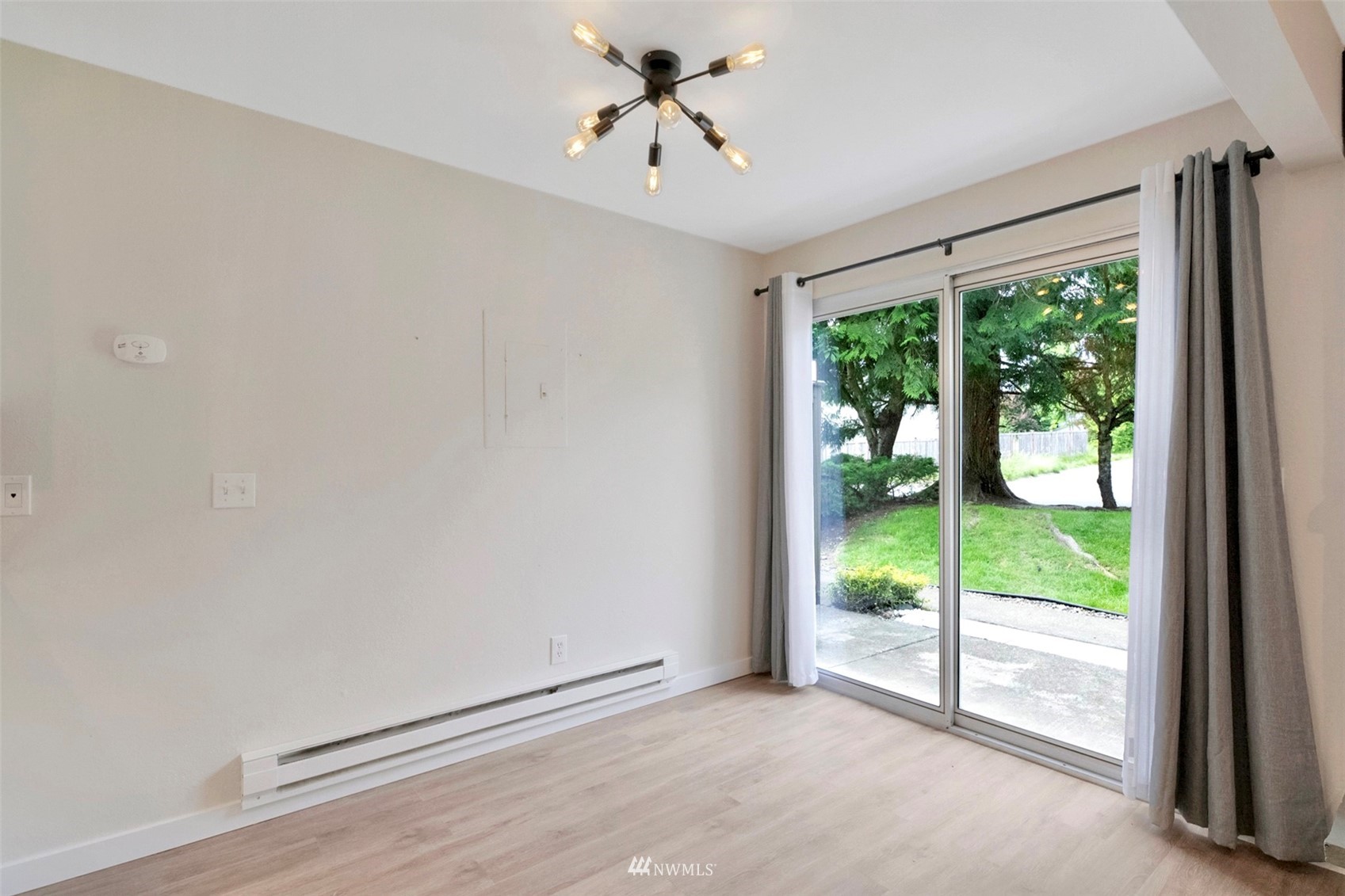 504 214th Street Southwest, Unit 23B Bothell, WA 98021 - Photo 9 of 23 a view of room with window and ceiling fan