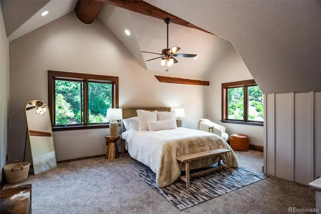a en suite bathroom with a sink and a mirror