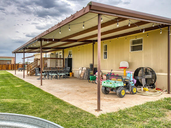 6341 Farm Private Road Levelland, TX 79336 - Photo 37 of 46 a view of a backyard with a patio
