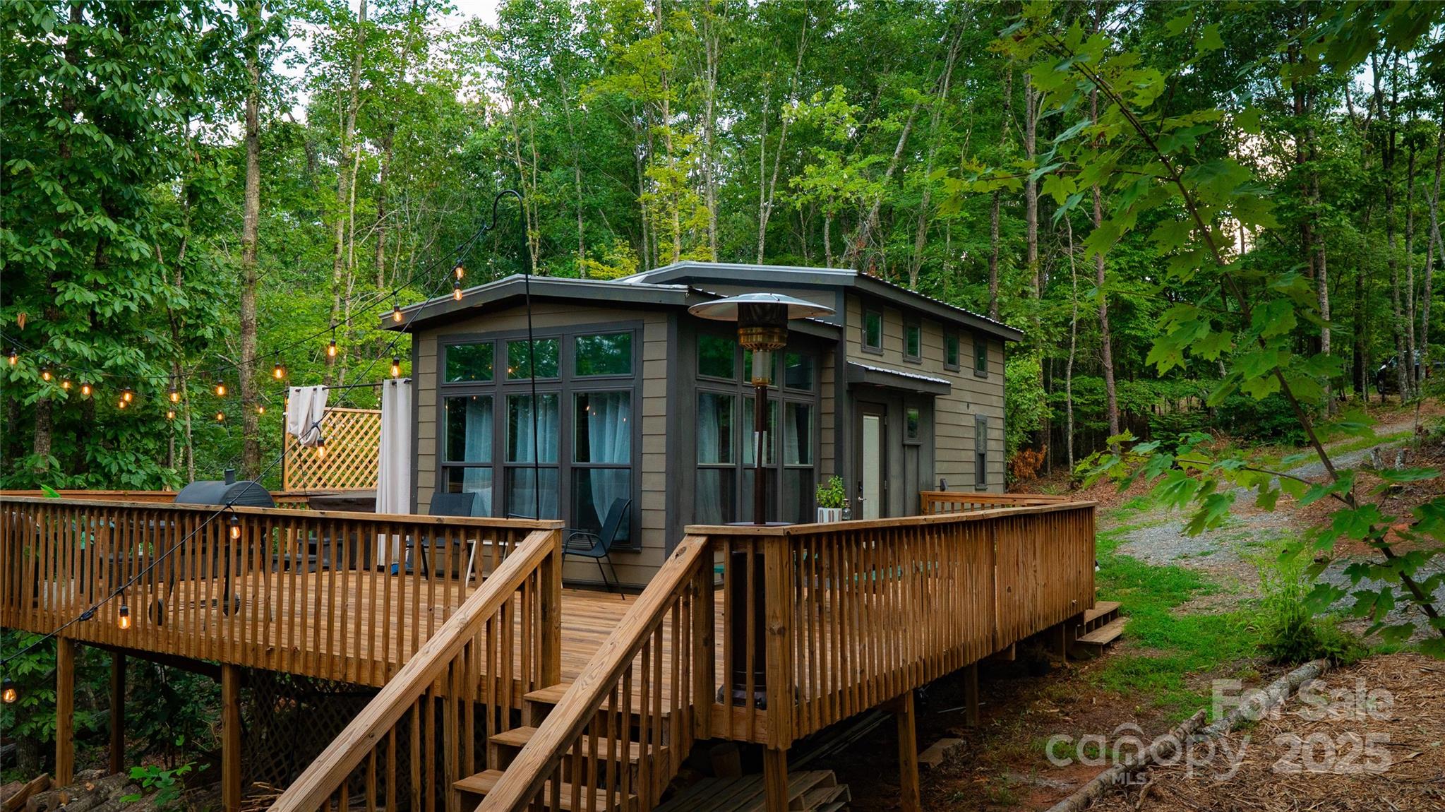 221 Summerfield Lane Rutherfordton, NC 28139 - Photo 14 of 37 a view of a roof deck with chair and wooden floor