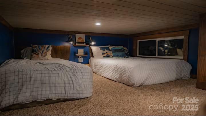 221 Summerfield Lane Rutherfordton, NC 28139 - Photo 25 of 37 a bedroom with double bed and a window