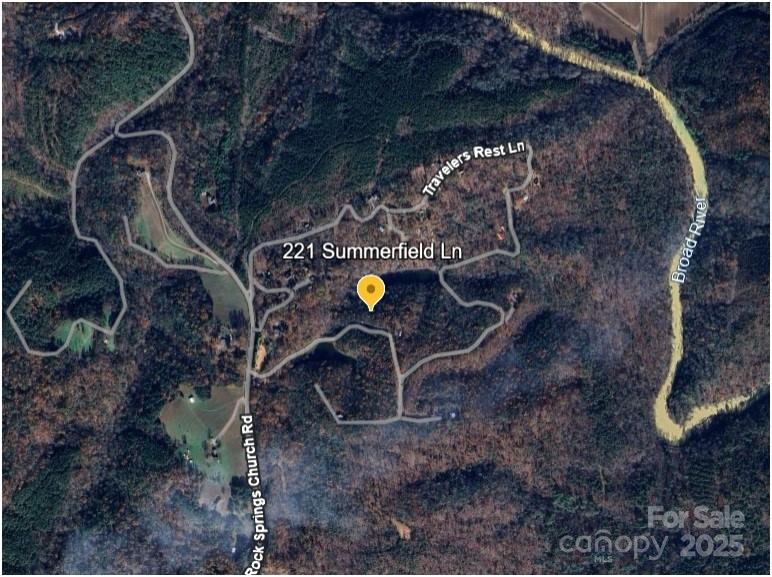 221 Summerfield Lane Rutherfordton, NC 28139 - Photo 30 of 37 a backyard of a house with outdoor seating