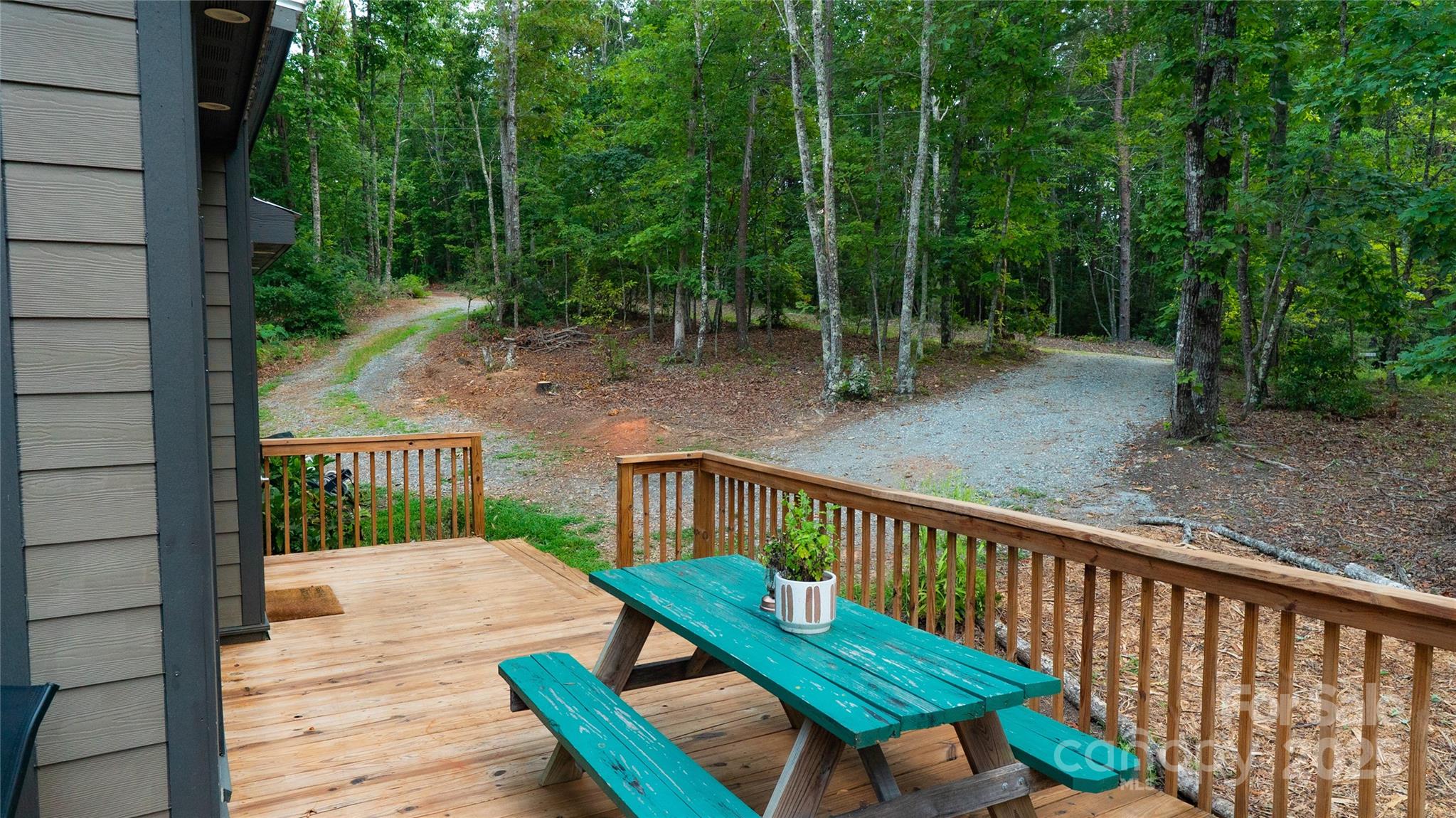 221 Summerfield Lane Rutherfordton, NC 28139 - Photo 34 of 37 a view of a wooden deck with a bench