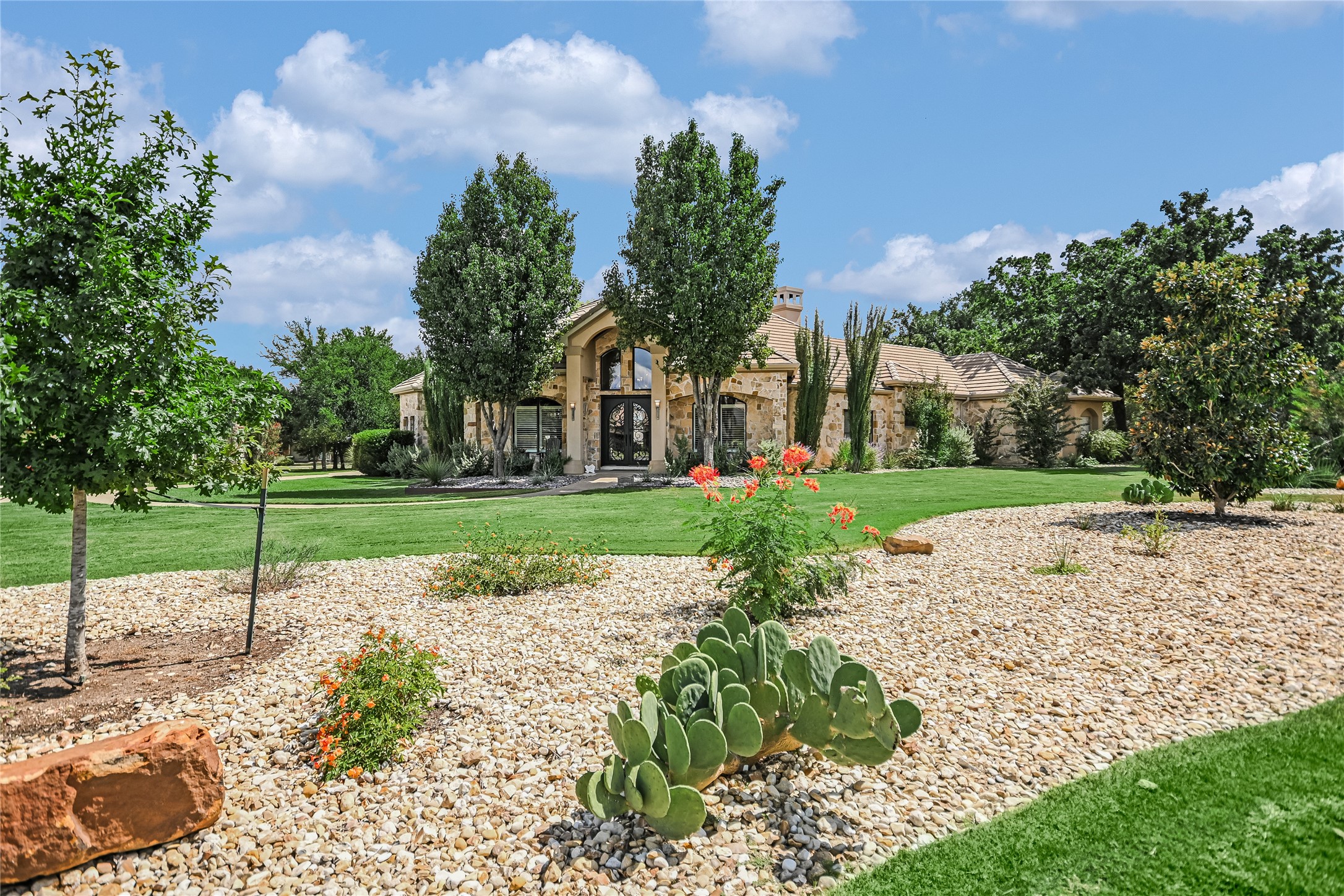 100 Dovetail Lane Georgetown, TX 78628 - Photo 1 of 34 Gorgeous front yard landscaping adds to the curb appeal.