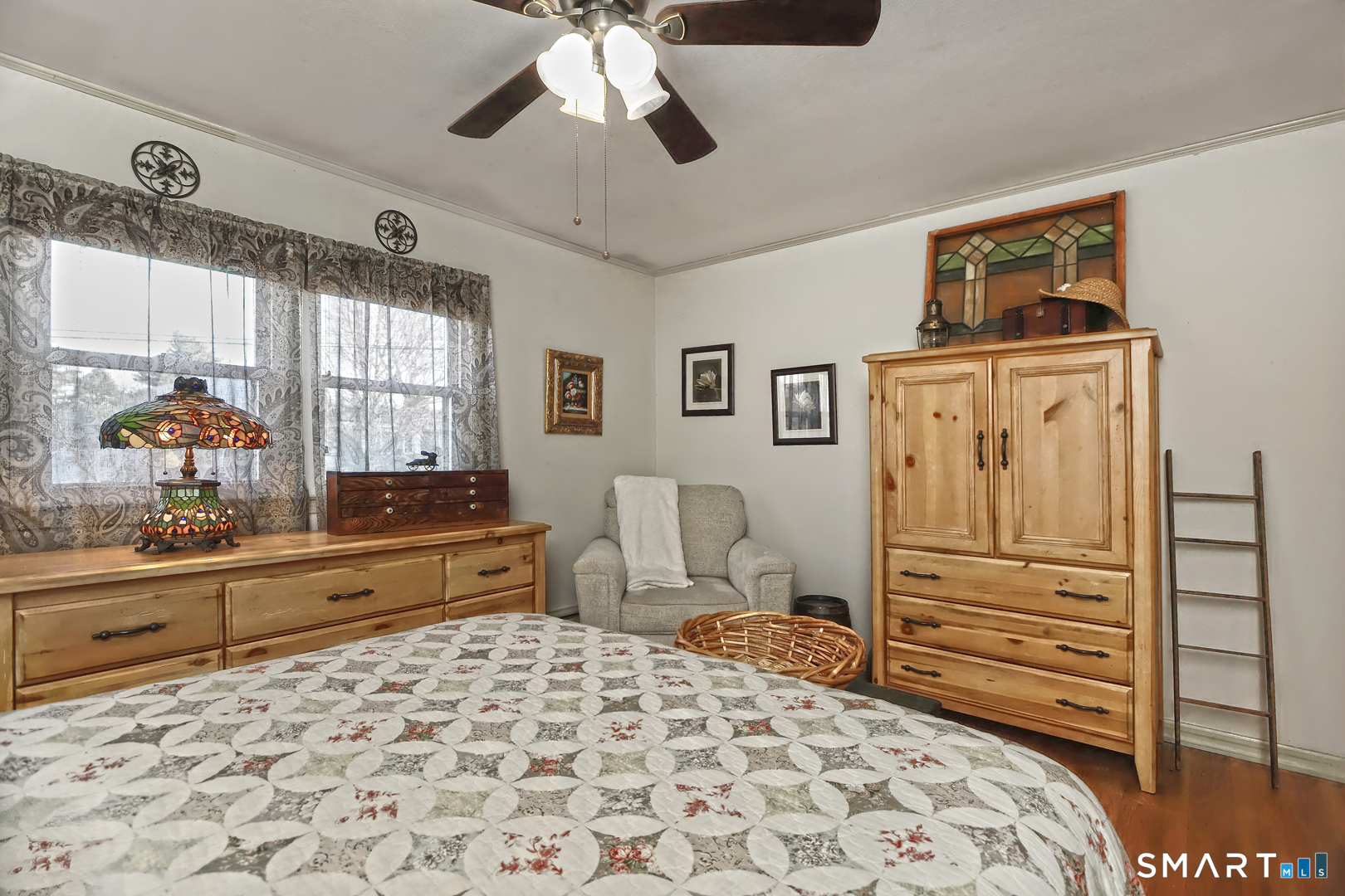 6 Mt Pleasant Road West Haven, CT 06516 - Photo 15 of 40 a bedroom with a bed and a dresser