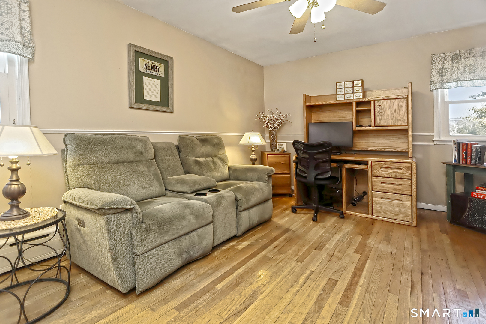 6 Mt Pleasant Road West Haven, CT 06516 - Photo 19 of 40 a living room with furniture and a flat screen tv