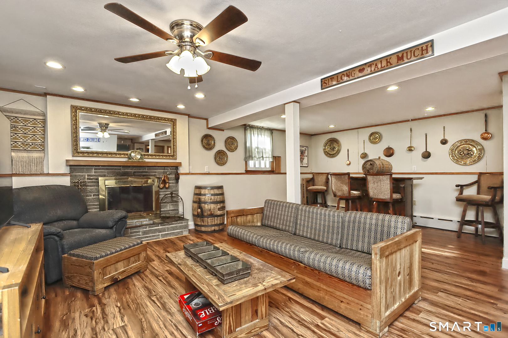 6 Mt Pleasant Road West Haven, CT 06516 - Photo 23 of 40 a living room with furniture and wooden floor