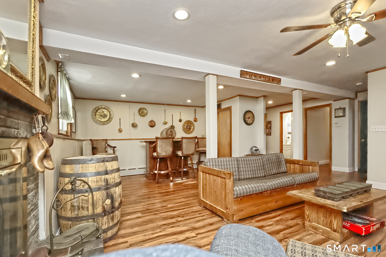 6 Mt Pleasant Road West Haven, CT 06516 - Photo 24 of 40 a living room with furniture and wooden floor