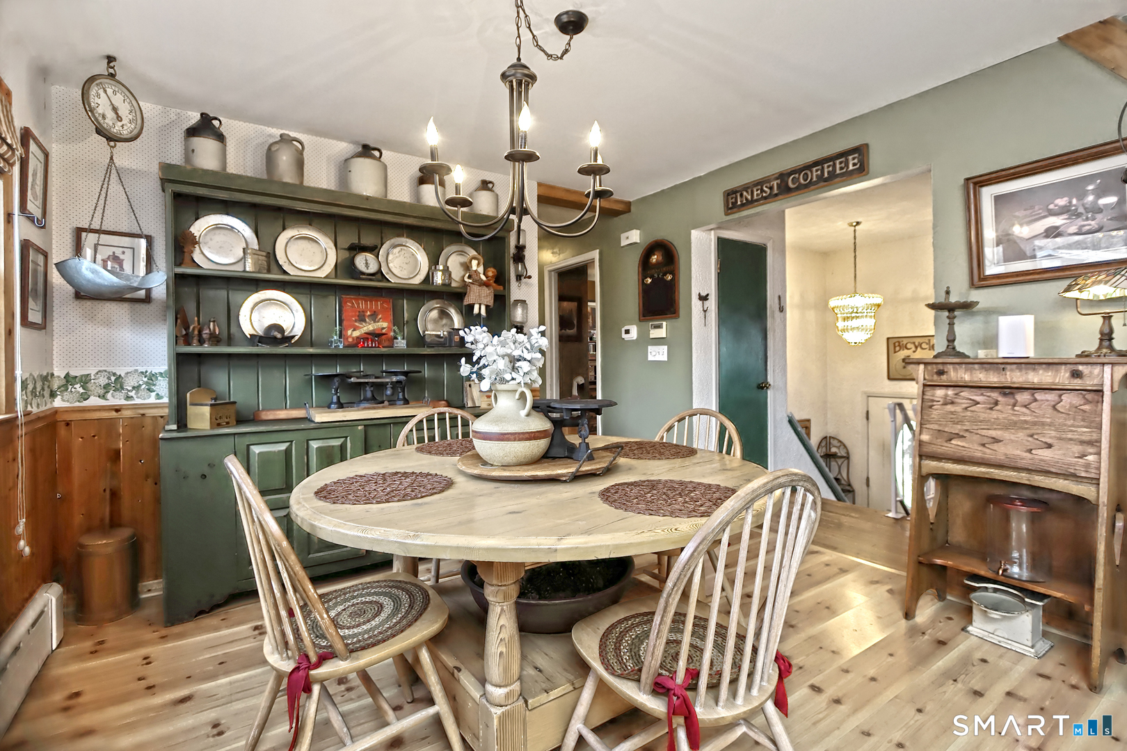 6 Mt Pleasant Road West Haven, CT 06516 - Photo 8 of 40 a view of a dining room with furniture and wooden floor
