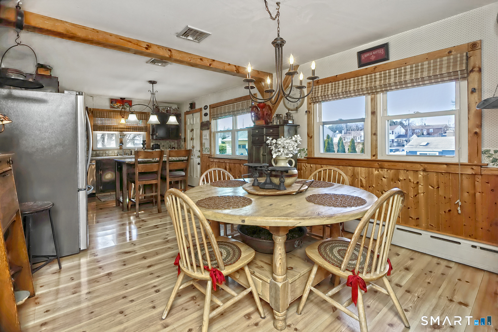 6 Mt Pleasant Road West Haven, CT 06516 - Photo 9 of 40 a view of a dining room with furniture wooden floor and chandelier