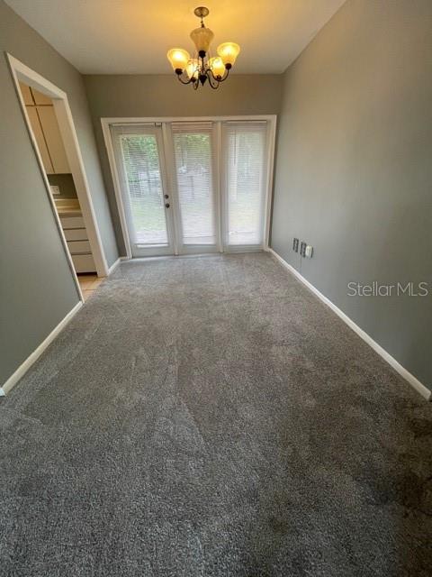 2501 Sheridan Road Mount Dora, FL 32757 - Photo 13 of 21 a view of an empty room with a window