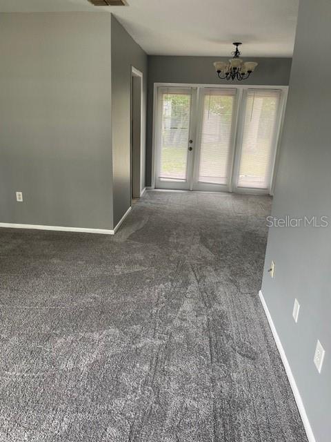 2501 Sheridan Road Mount Dora, FL 32757 - Photo 14 of 21 an empty room with windows and closet