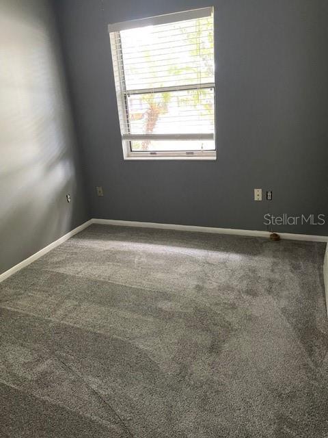 2501 Sheridan Road Mount Dora, FL 32757 - Photo 18 of 21 an empty room with a window