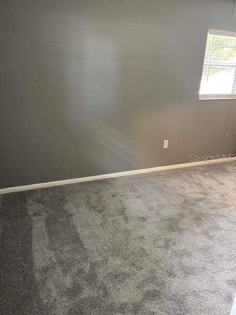 2501 Sheridan Road Mount Dora, FL 32757 - Photo 19 of 21 a view of an empty room and window