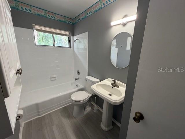 2501 Sheridan Road Mount Dora, FL 32757 - Photo 21 of 21 a bathroom with a sink toilet and shower