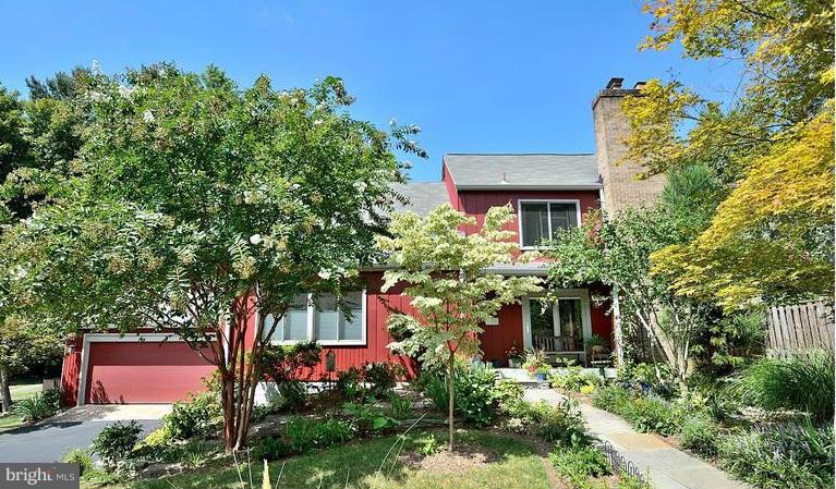 1416 Green Run Lane Reston, VA 20190 - Photo 1 of 29 a front view of a house with a yard
