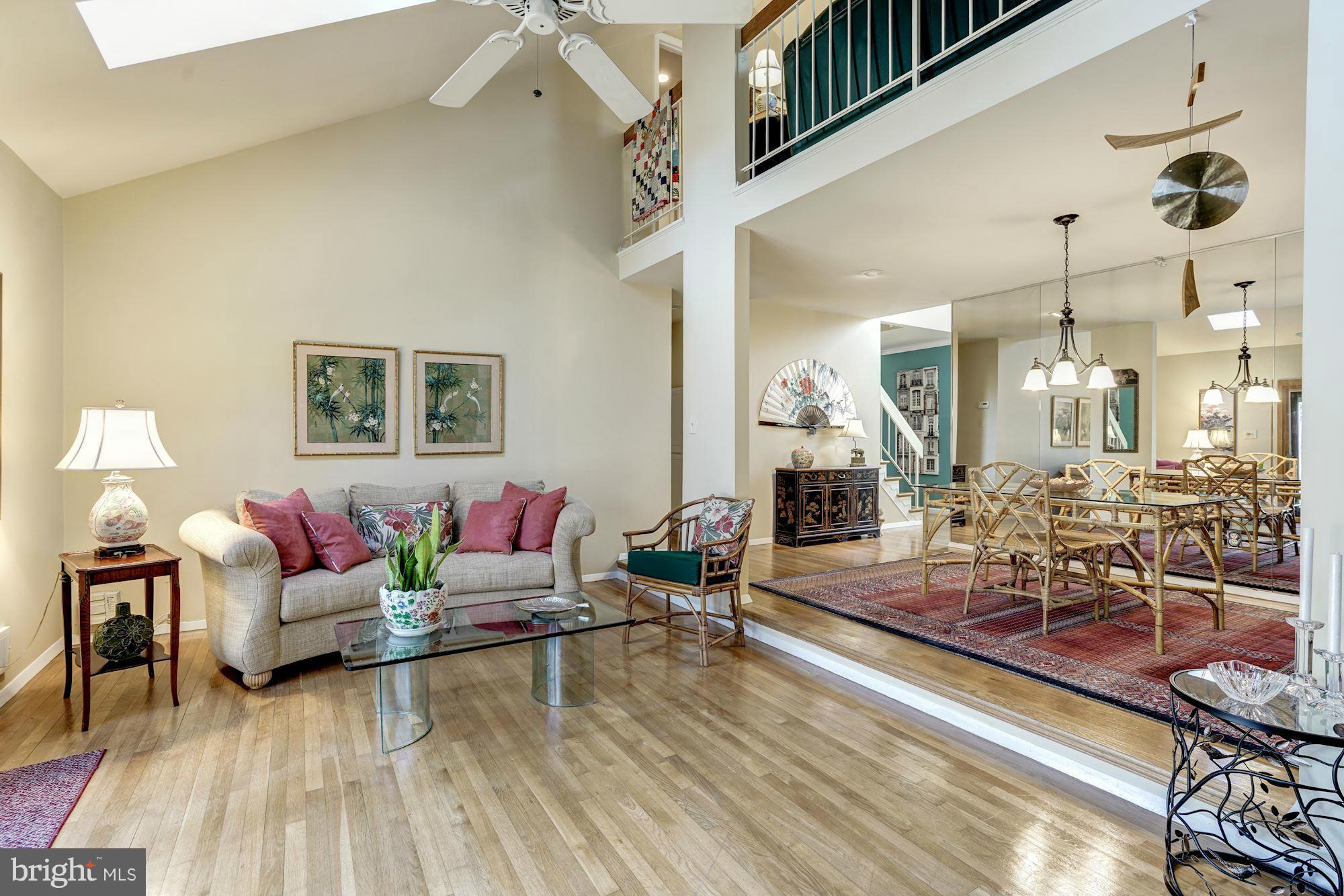 1416 Green Run Lane Reston, VA 20190 - Photo 10 of 29 a living room with furniture and wooden floor