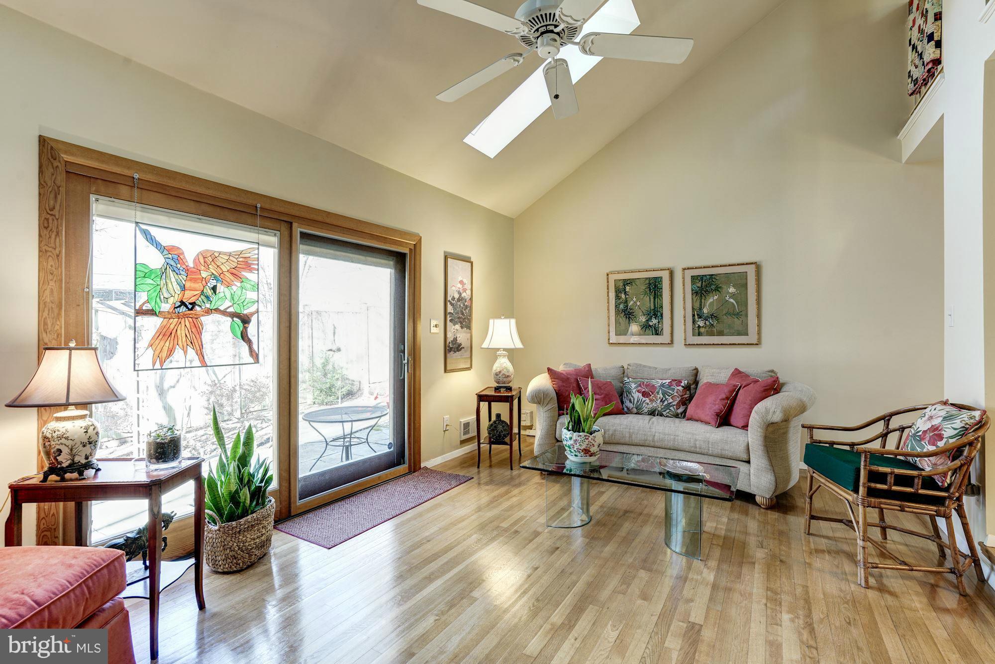1416 Green Run Lane Reston, VA 20190 - Photo 11 of 29 a living room with furniture and wooden floor