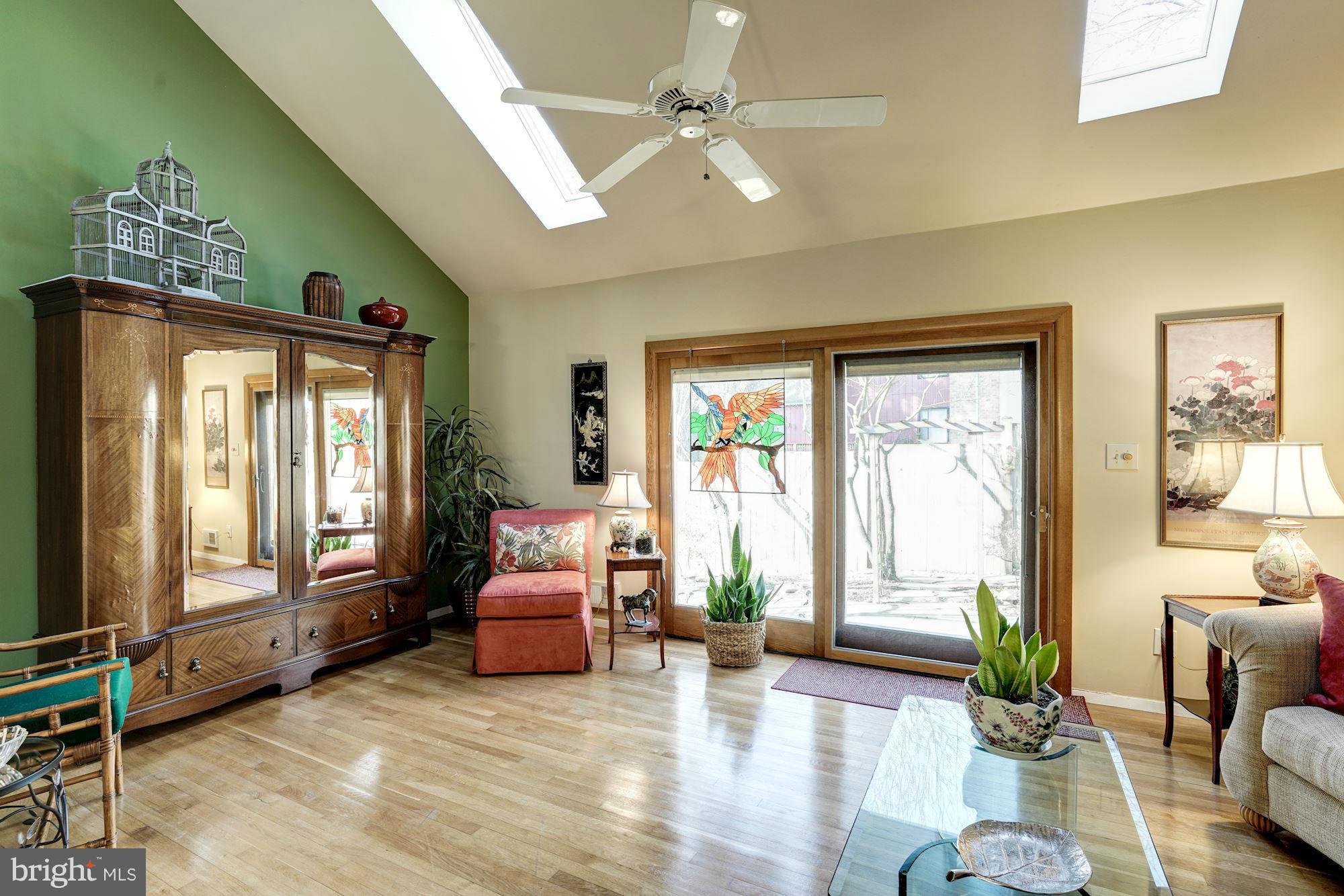 1416 Green Run Lane Reston, VA 20190 - Photo 13 of 29 a living room with furniture and wooden floor