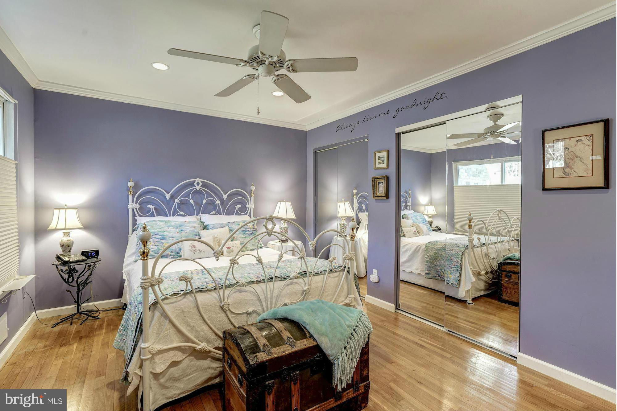 1416 Green Run Lane Reston, VA 20190 - Photo 14 of 29 a bedroom with a bed and wooden floor