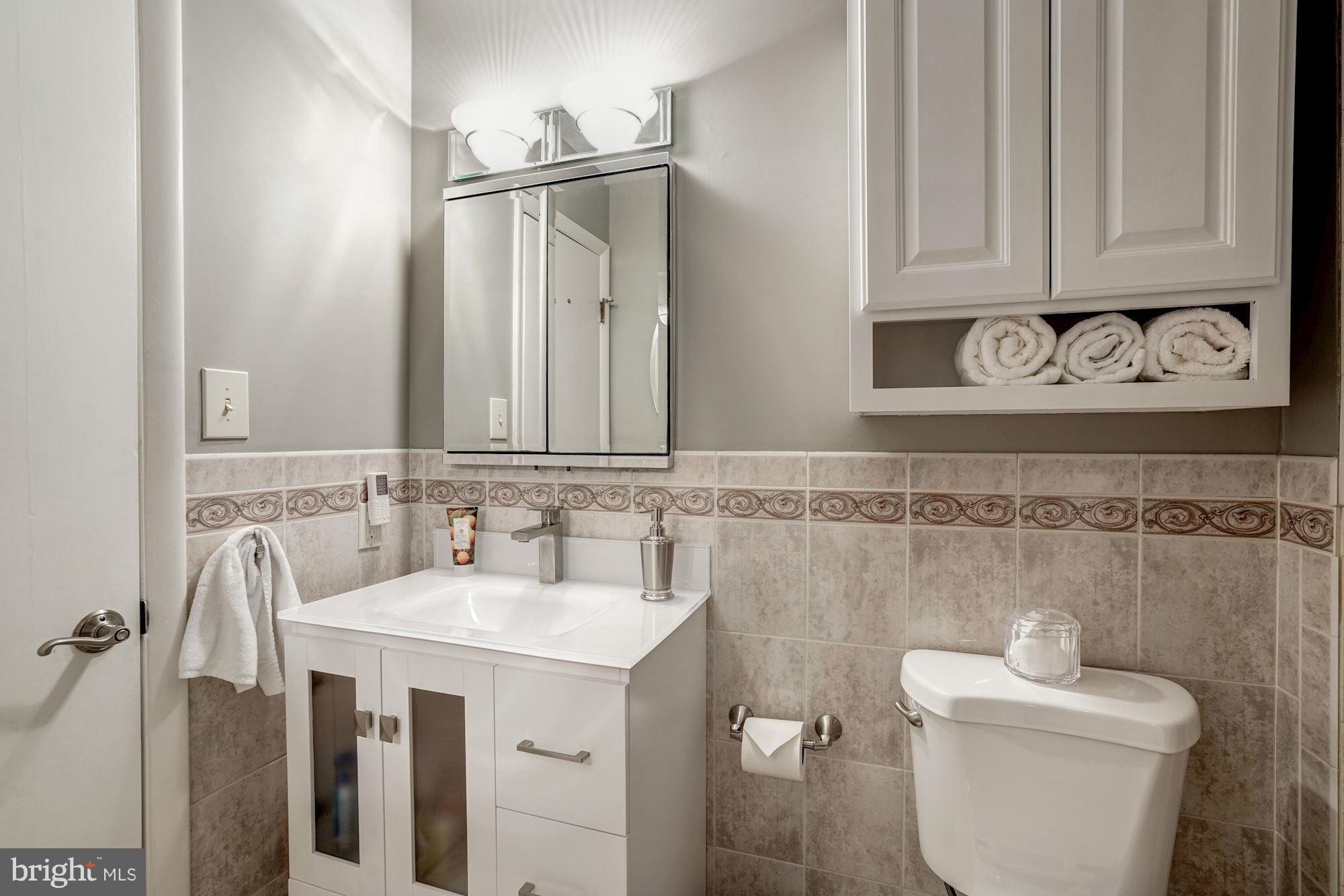 1416 Green Run Lane Reston, VA 20190 - Photo 15 of 29 a bathroom with a sink and a toilet