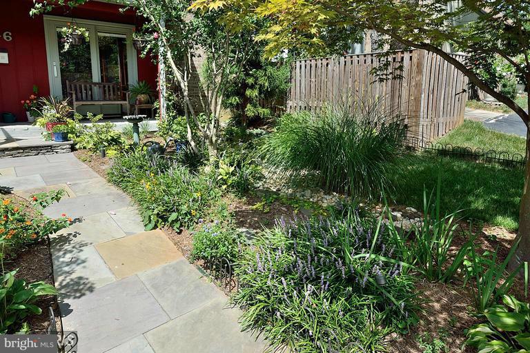 1416 Green Run Lane Reston, VA 20190 - Photo 22 of 29 a view of a garden with pathway