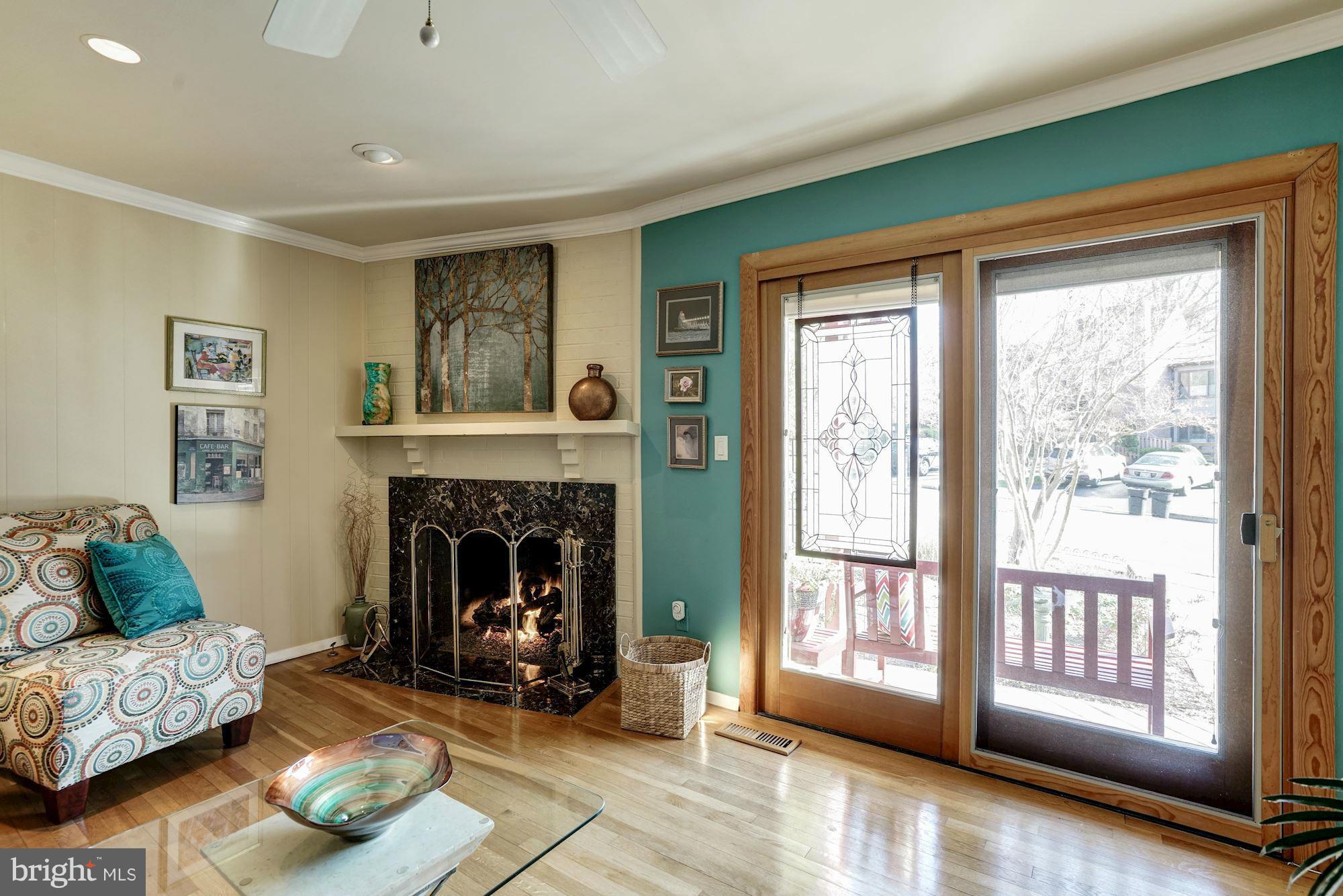 1416 Green Run Lane Reston, VA 20190 - Photo 4 of 29 a living room with furniture and a fireplace