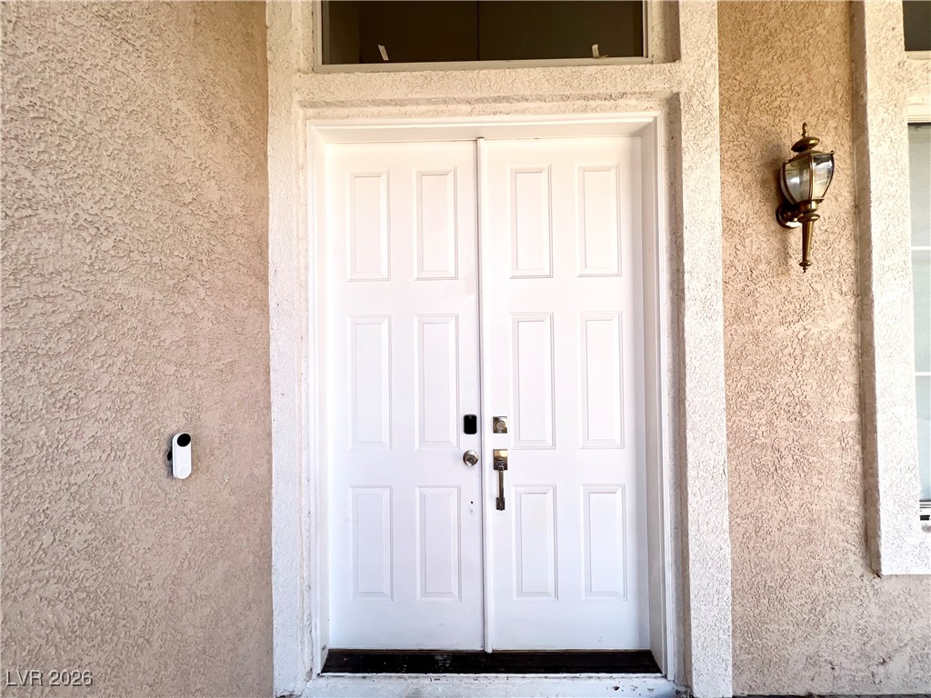 2218 Armacost Drive Henderson, NV 89074 - Photo 2 of 31 Entrance to property featuring stucco siding