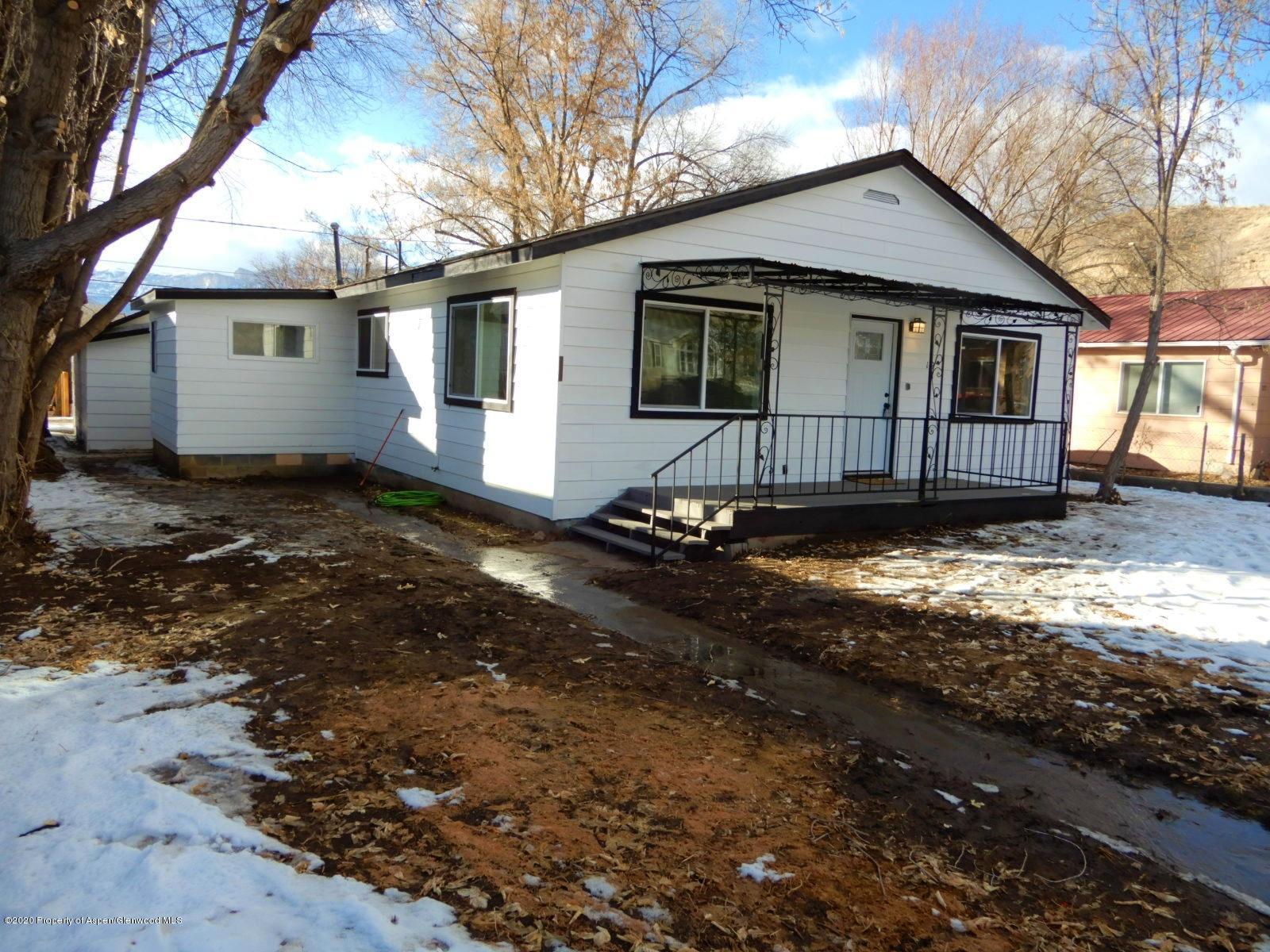 119 June Avenue Rifle, CO 81650 - Photo 1 of 24 a view of a house with a yard