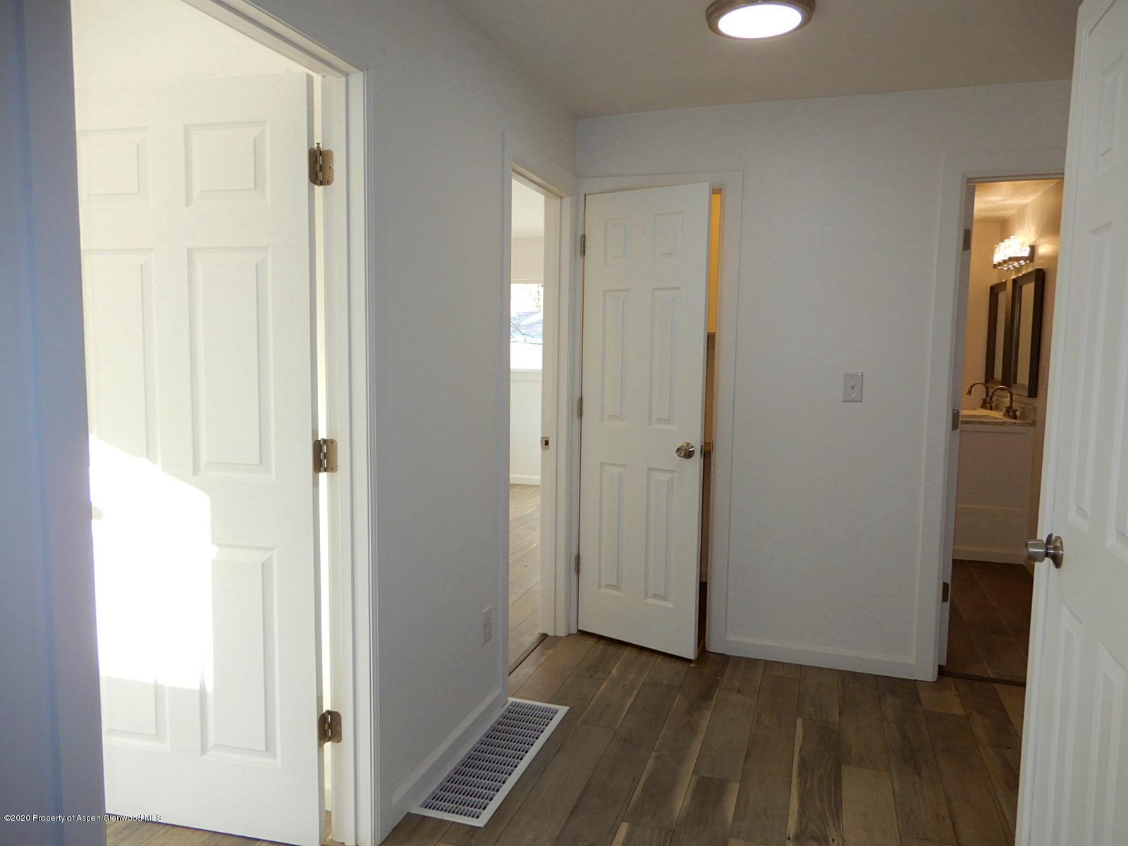 119 June Avenue Rifle, CO 81650 - Photo 14 of 24 a view of a room with wooden floor