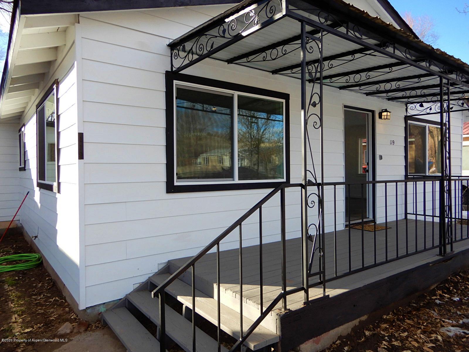 119 June Avenue Rifle, CO 81650 - Photo 3 of 24 a view of porch with a small cabin