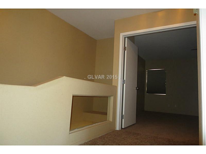 10134 Rice Paper Street Las Vegas, NV 89183 - Photo 15 of 35 Property Photo. Upstairs Hallway looking into MBR