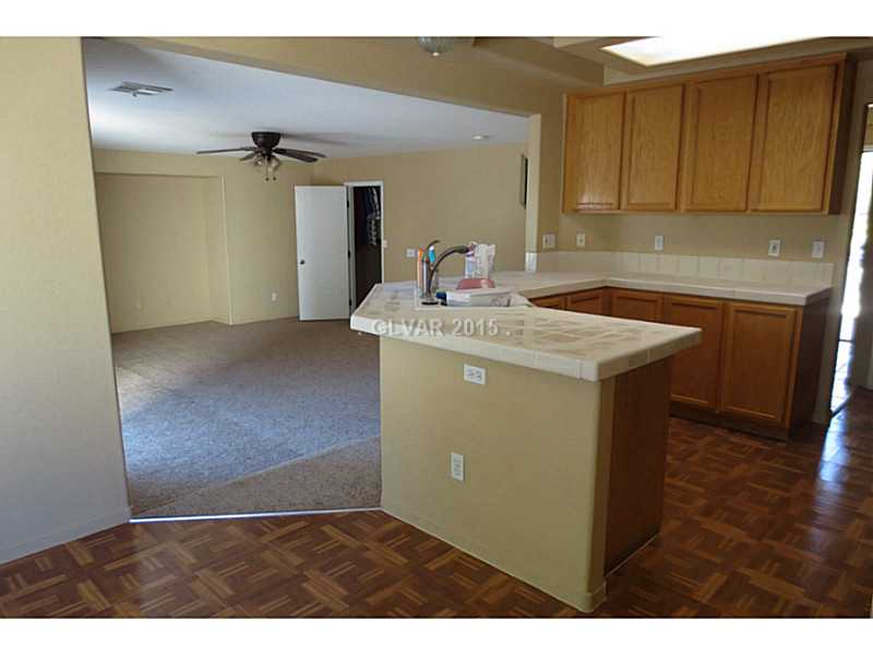 10134 Rice Paper Street Las Vegas, NV 89183 - Photo 6 of 35 Property Photo. Kitchen into Living Room