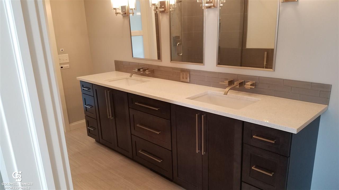 8068 Comstock Road Avoca, MI 48006 - Photo 8 of 30 This is a view of the master bath.