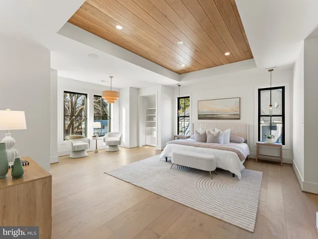 a living room with furniture and white walls