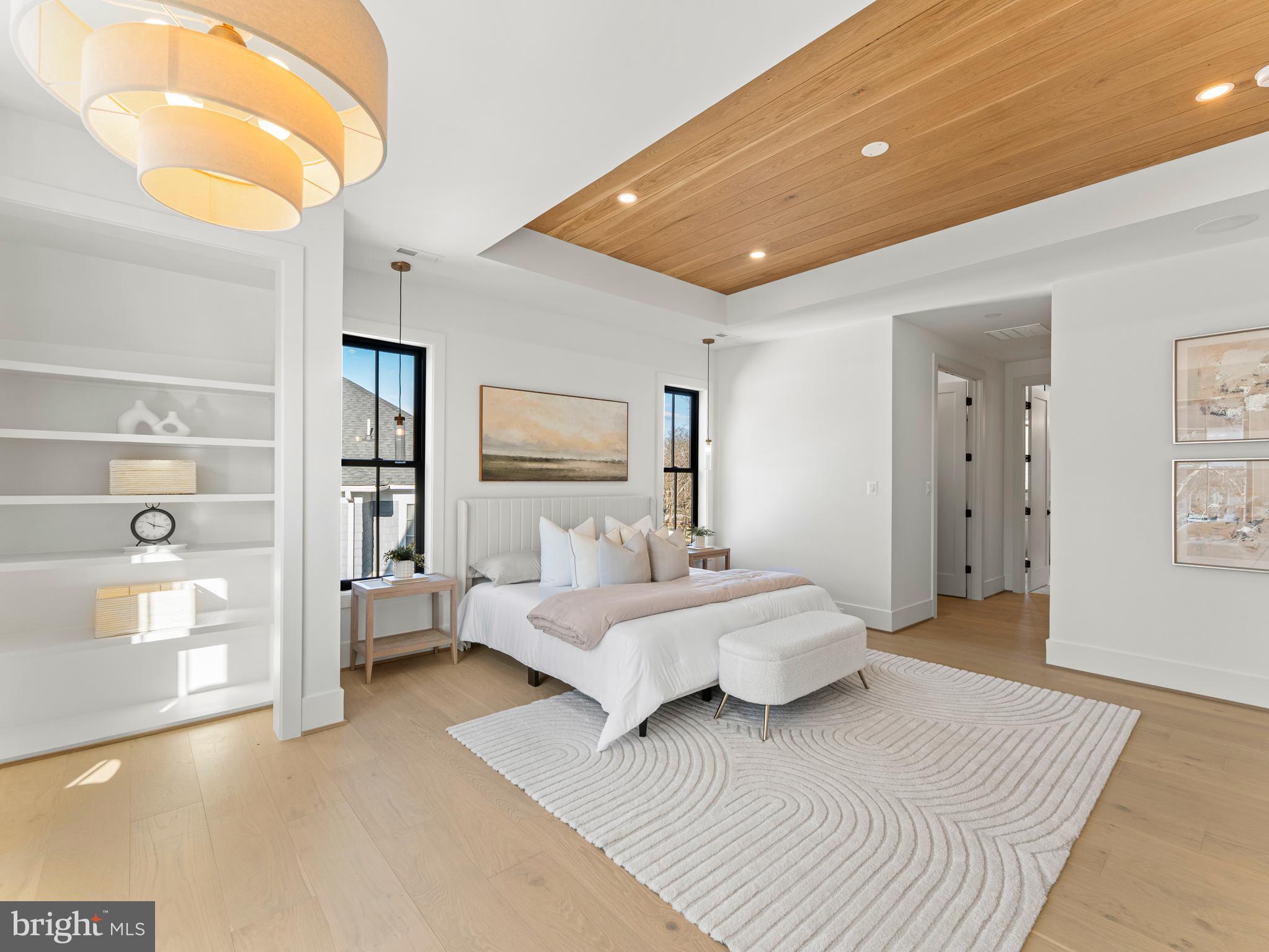 406 Dove Circle Southwest Vienna, VA 22180 - Photo 24 of 47 a bedroom with a bed and a cabinets