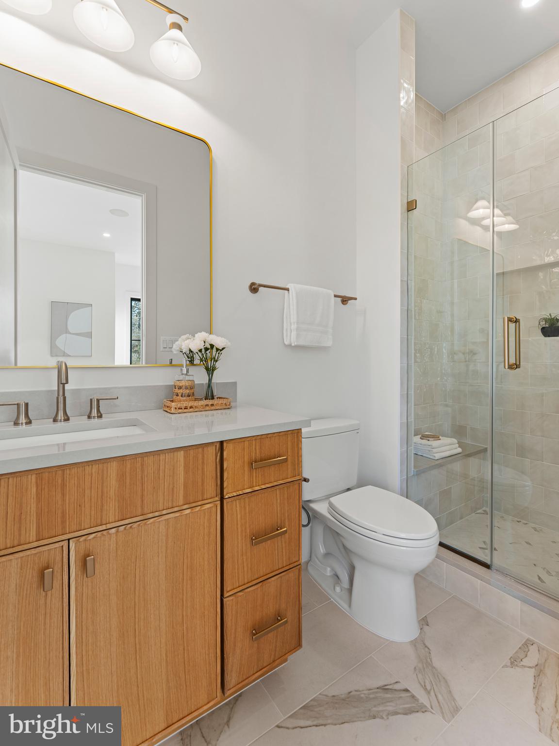 406 Dove Circle Southwest Vienna, VA 22180 - Photo 32 of 47 a bathroom with a sink toilet and shower