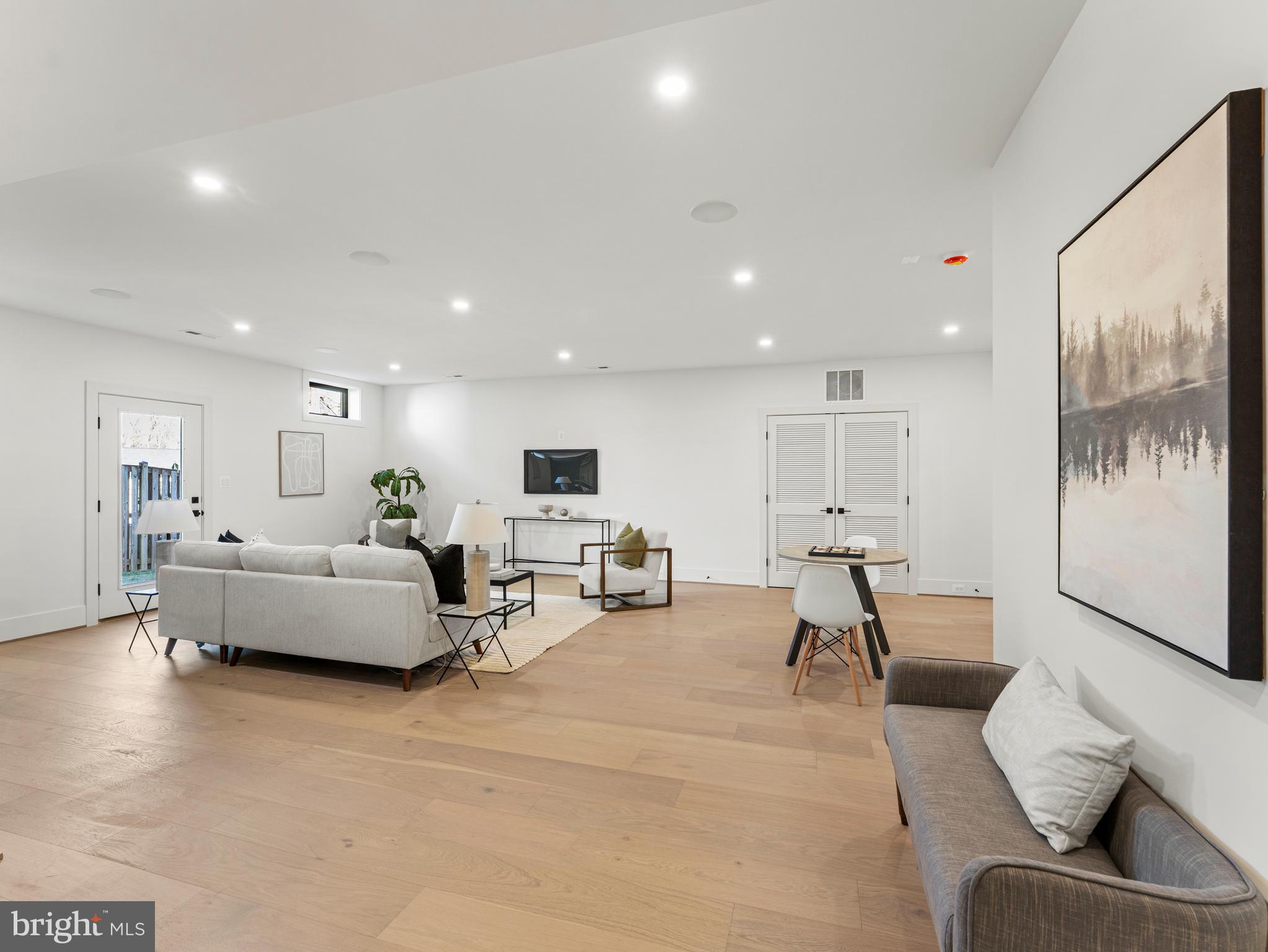 406 Dove Circle Southwest Vienna, VA 22180 - Photo 41 of 47 a living room with furniture and a flat screen tv