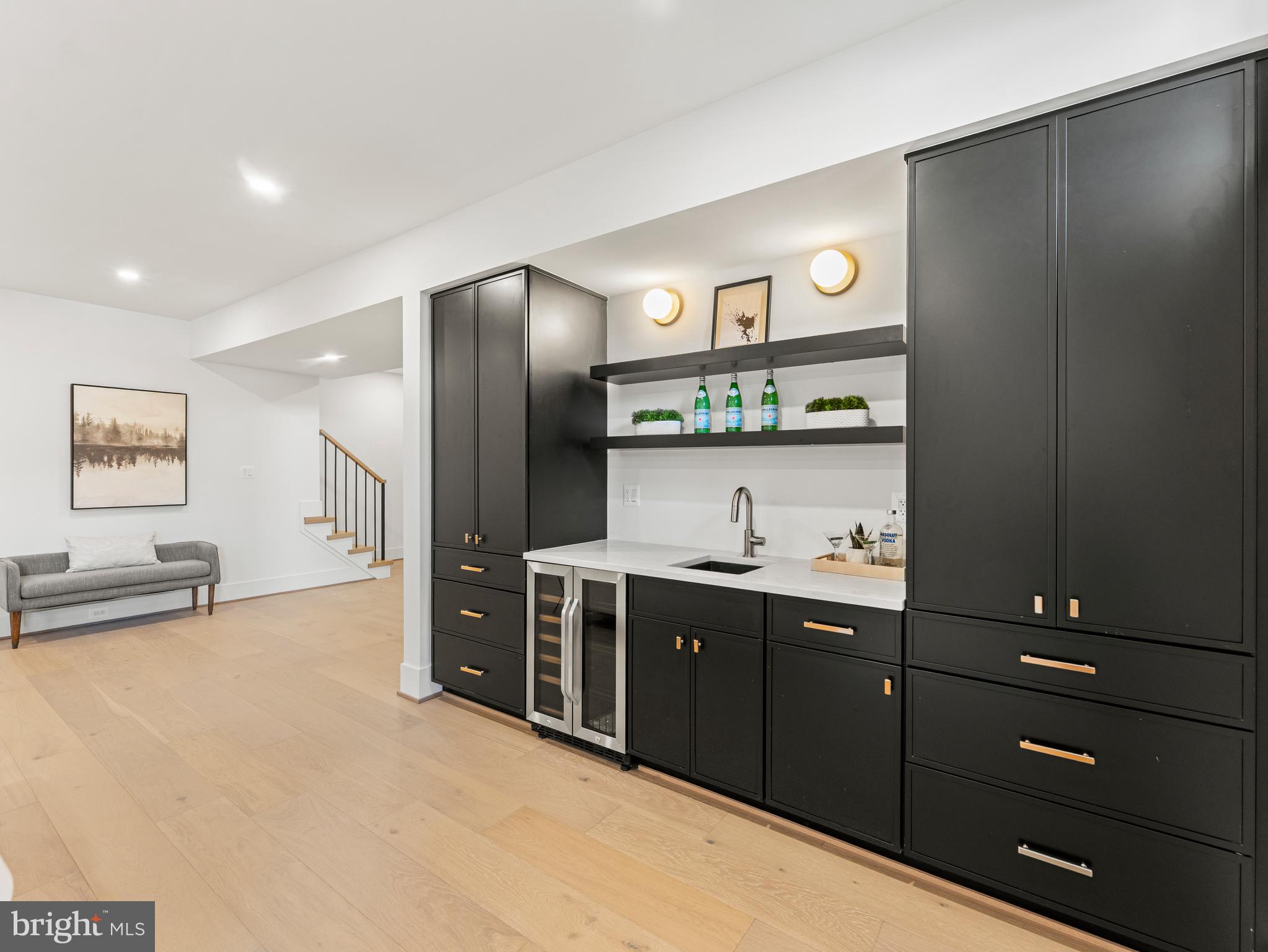 406 Dove Circle Southwest Vienna, VA 22180 - Photo 45 of 47 a kitchen with stainless steel appliances granite countertop a refrigerator and a sink
