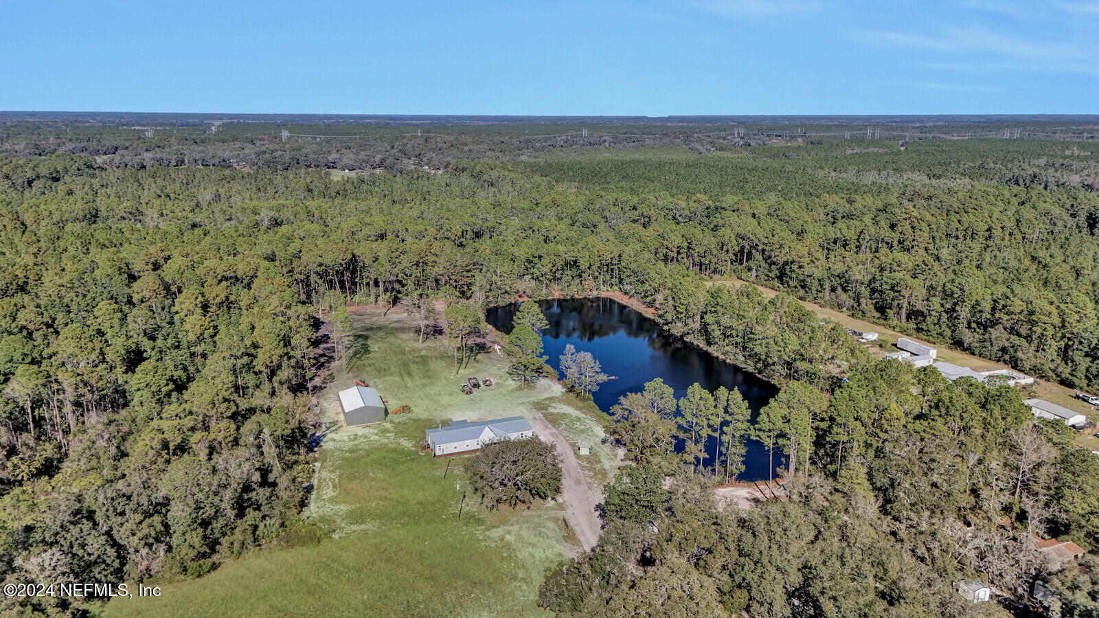 141 Woods Road San Mateo, FL 32187 - Photo 41 of 64 52_DJI_20241221023338_0081_mls