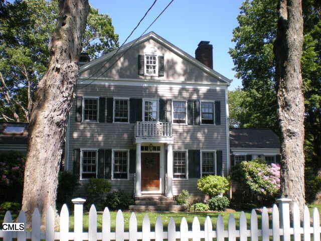 142 Wilton Road West Ridgefield, CT 06877 - Photo 1 of 1 a front view of house with a yard