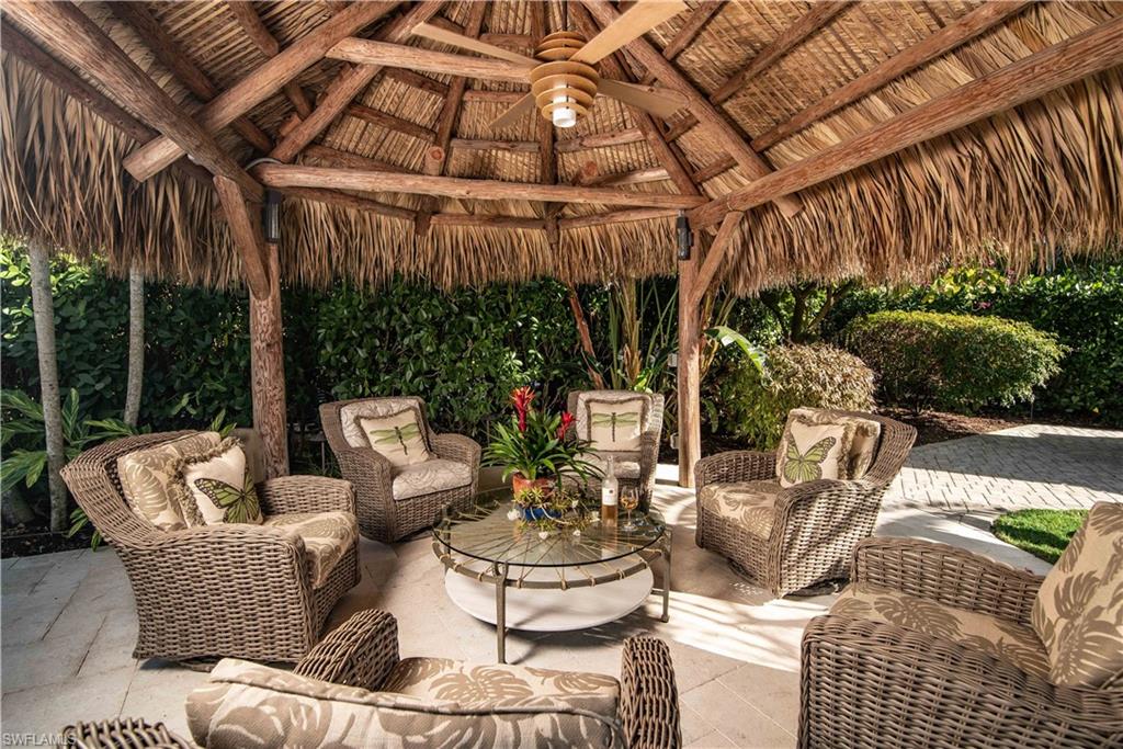 13614 Snapper Lane Naples, FL 34114 - Photo 11 of 19 a outdoor living space with furniture and garden view