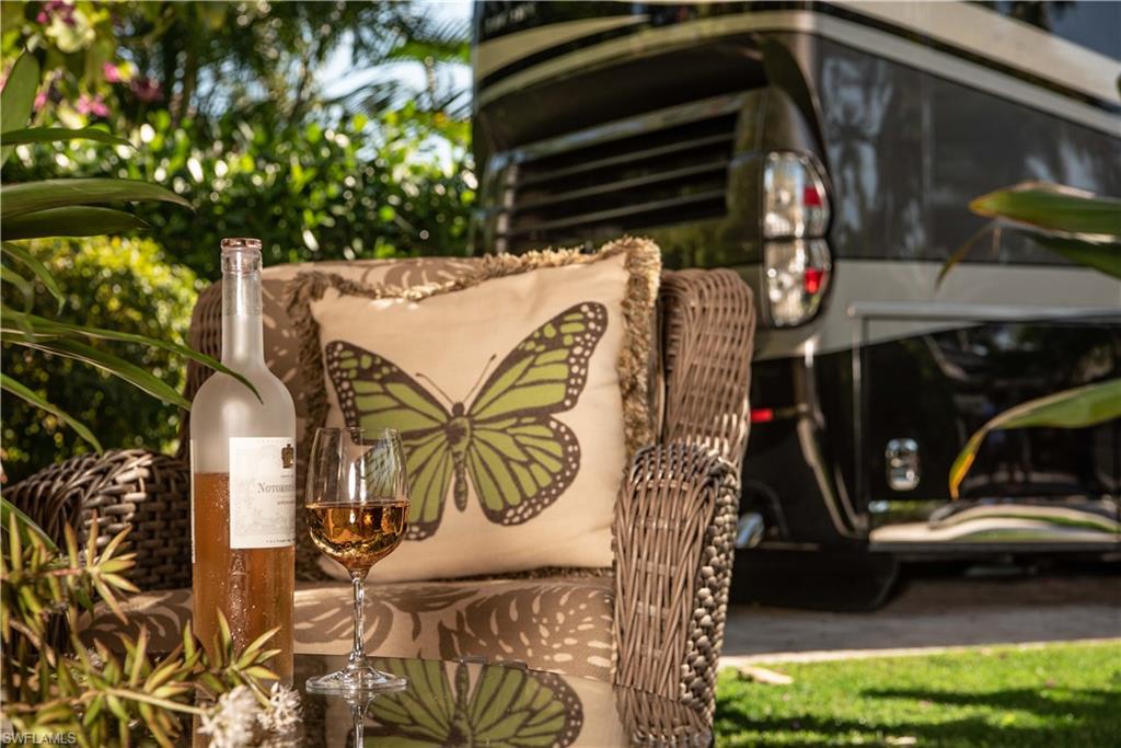13614 Snapper Lane Naples, FL 34114 - Photo 16 of 19 a view of outdoor space and porch