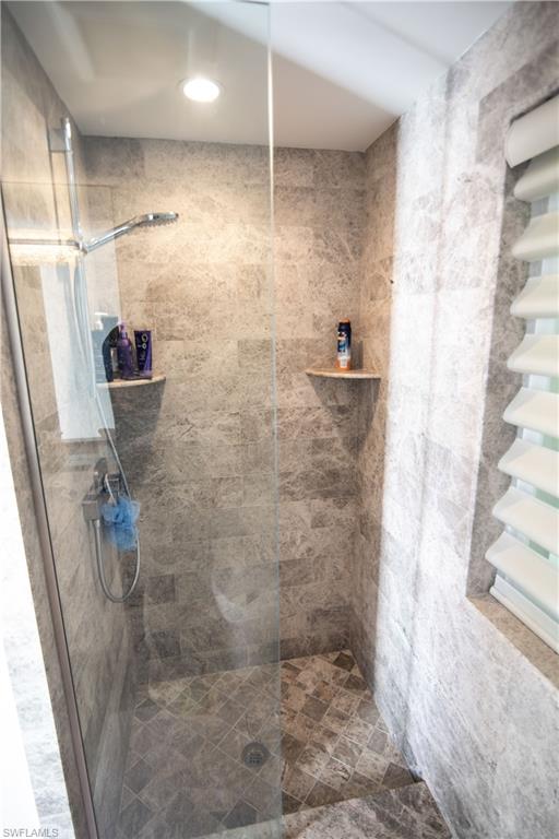13614 Snapper Lane Naples, FL 34114 - Photo 7 of 19 a bathroom with a shower