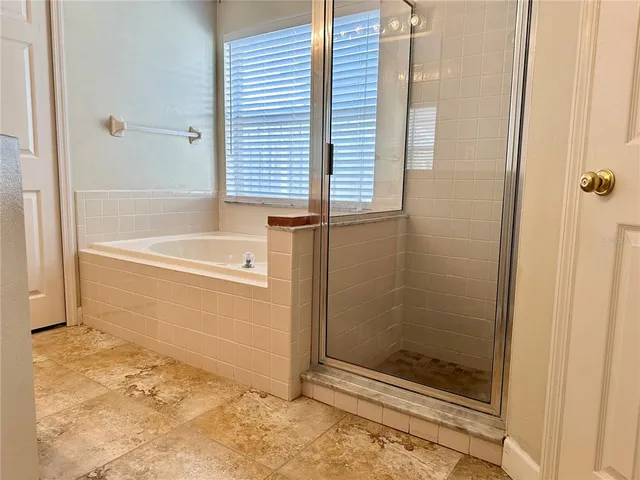 a bathroom with a bath tub