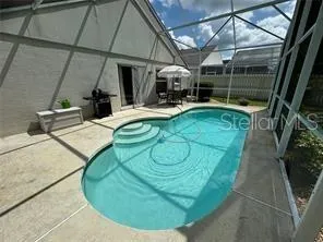 a view of a big yard next to a house